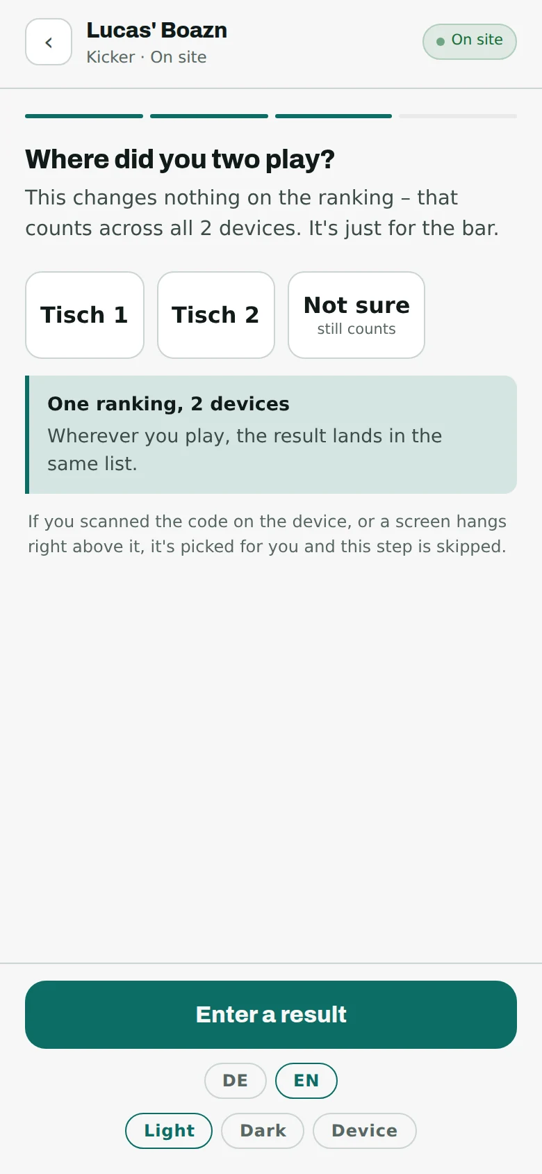 The table picker on the phone with buttons for table 1, table 2 and “not sure – counts anyway”, and an explanatory box below.